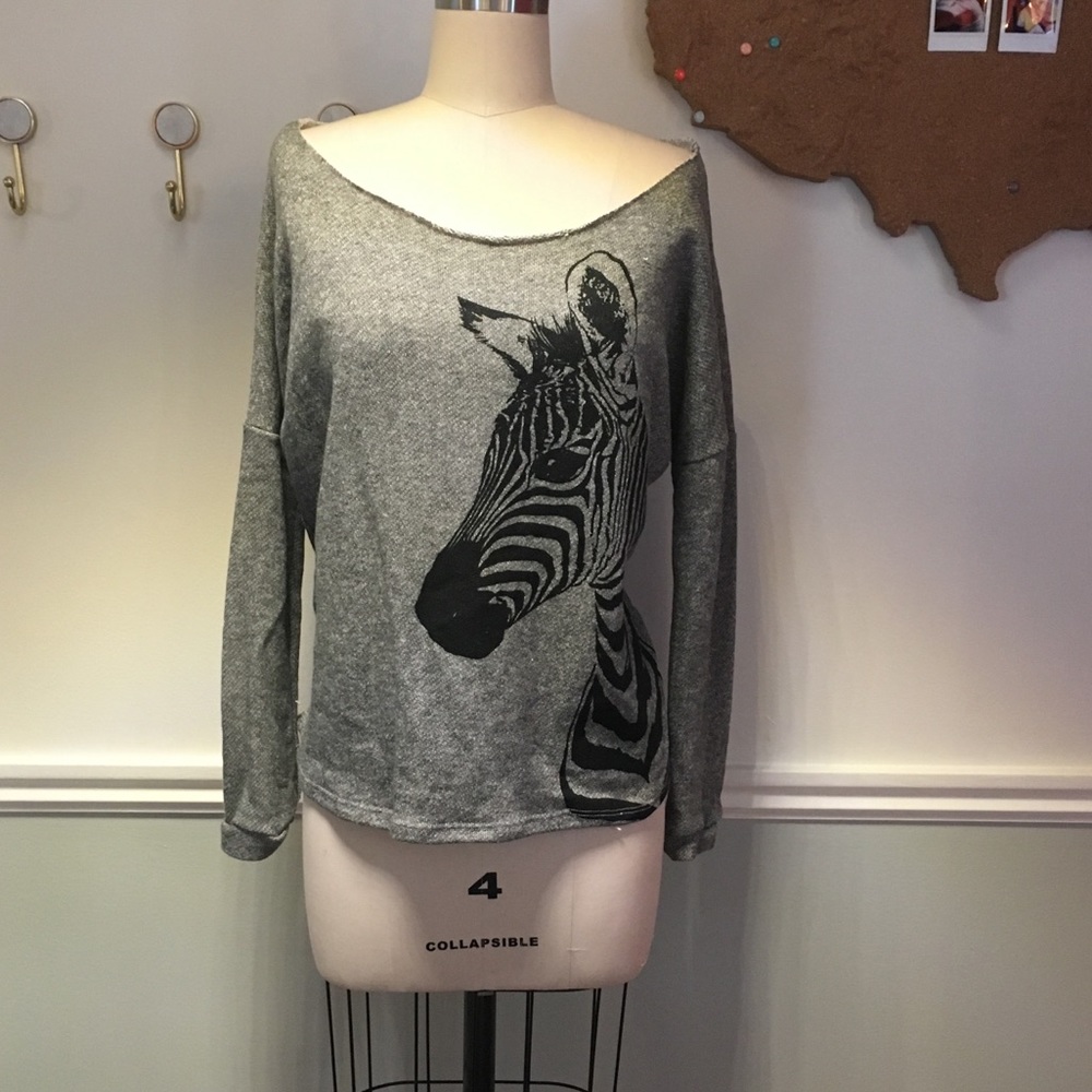 Wide neck zebra print sweatshirt with open back